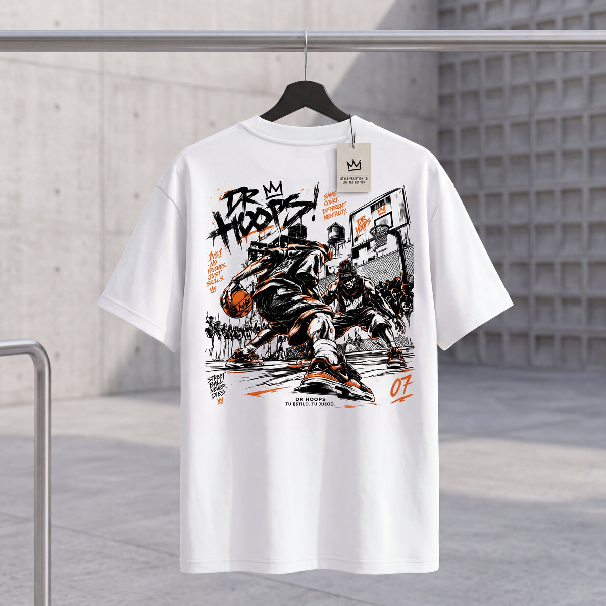 A white short-sleeve graphic T-shirt hanging on a black hanger against a concrete wall. The back of the shirt features a large black and orange street-style basketball graphic with the text 'DR.